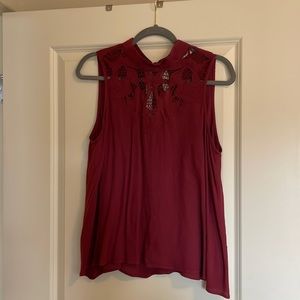 Sleeveless Maroon ASTR top